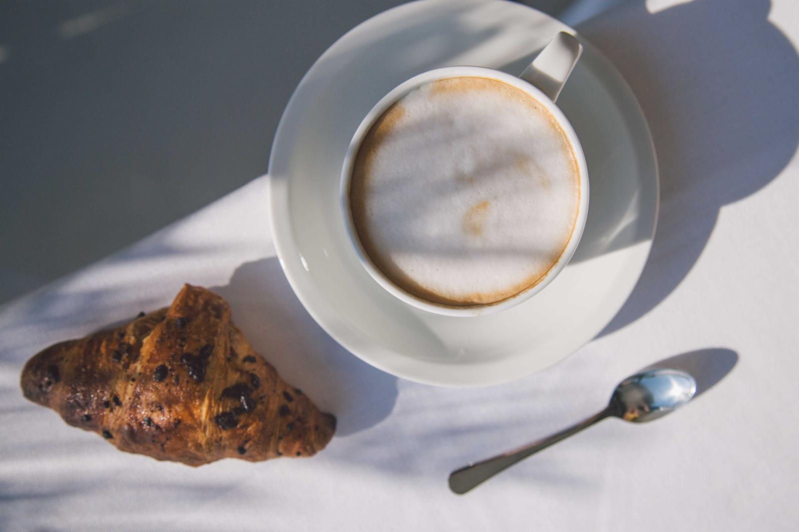 Cappuccino and croissant for breakfast